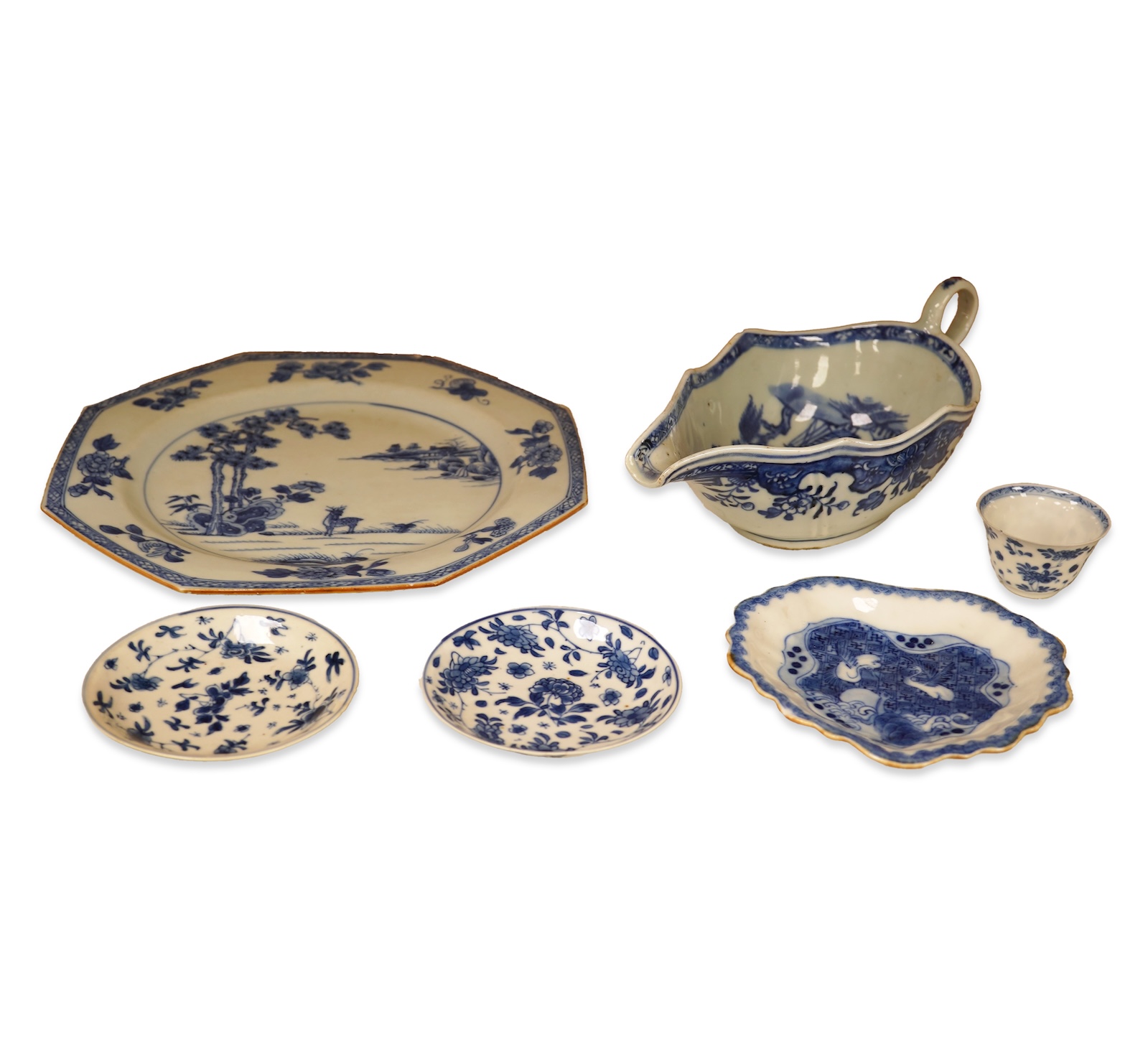 A Chinese export blue and white blue plate, sauceboat and Ko-sometsuke type dish together with a miniature tea bowl and two saucers. Plate 22cm diameter